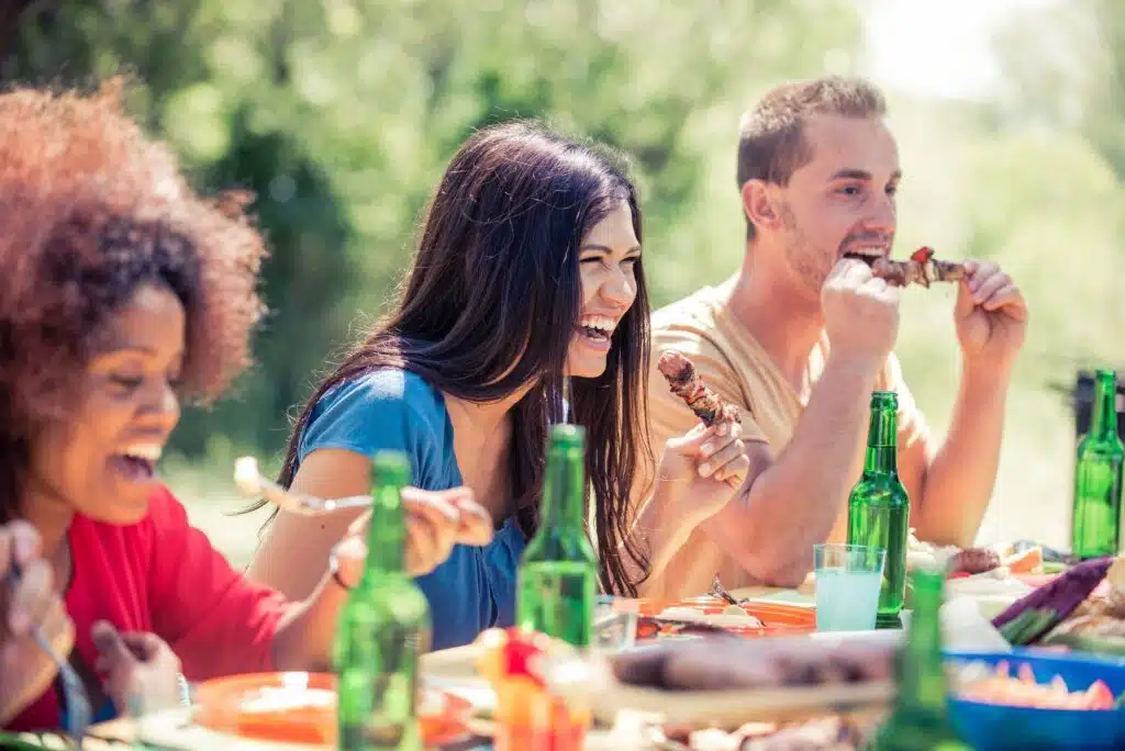 people eating at a barbecue party